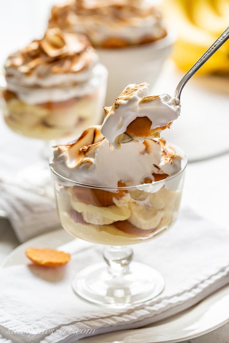 A spoonful of pudding with meringue and Vanilla Wafer cookies