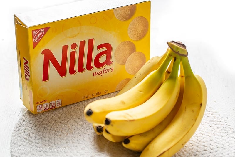 A box of vanilla wafers and a bunch of bananas