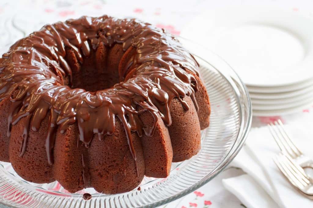 Chocolate Pound Cake ~ rich and decadent, this easy to make dessert is topped with a silky smooth chocolate glaze - perfect for the chocoholic in your life!  www.savingdessert.com