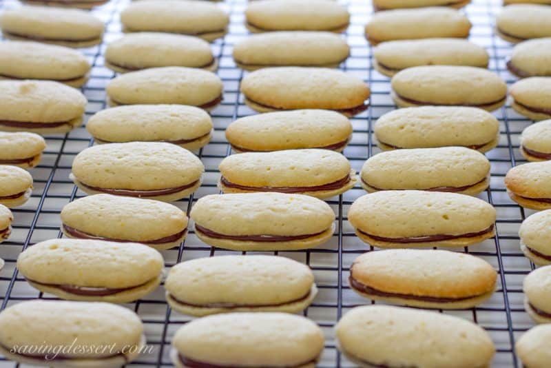 Homemade {CopyCat} Orange Milano Cookies ~ delicious vanilla cookies with a dark chocolate center flavored with orange zest  www.savingdessert.com