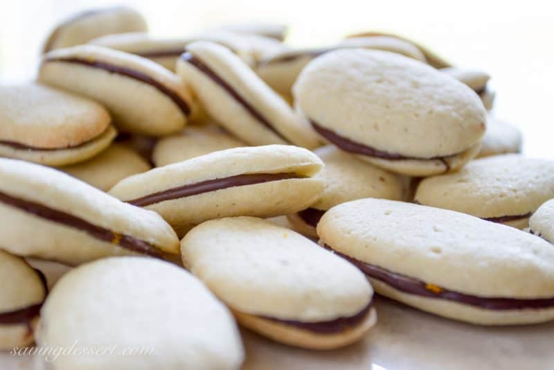 Homemade {CopyCat} Orange Milano Cookies ~ delicious vanilla cookies with a dark chocolate center flavored with orange zest  www.savingdessert.com