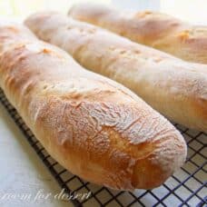 A closeup of a fresh baked loaf of baguette