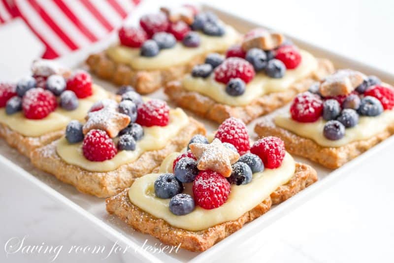 Star-studded berry tarts with vanilla pastry cream in a red, white and blue theme