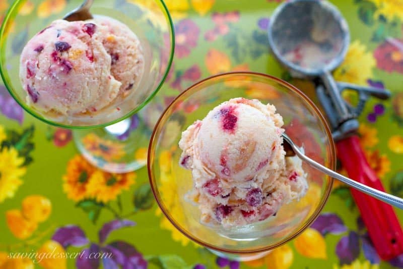 Tutti Frutti Ice Cream ~ with a fresh peach base and plenty of fresh cherries, strawberries, and a few chunks of frozen banana, and don't forget the rum!  www.savingdessert.com