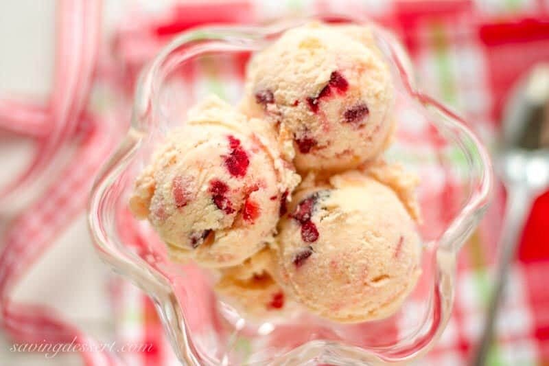 Tutti Frutti Ice Cream ~ with a fresh peach base and plenty of fresh cherries, strawberries, and a few chunks of frozen banana, and don't forget the rum!  www.savingdessert.com