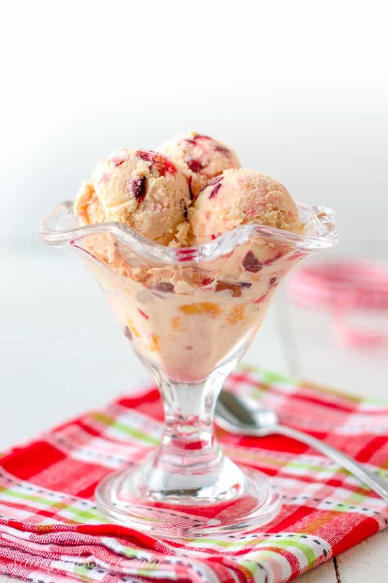 Tutti Frutti Ice Cream ~ with a fresh peach base and plenty of fresh cherries, strawberries, and a few chunks of frozen banana, and don't forget the rum!  www.savingdessert.com