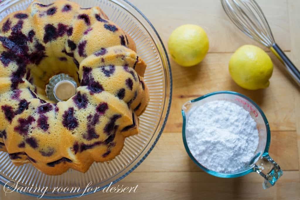 Blueberry Lemon Pound Cake - A deliciously moist classic pound cake stuffed full of ripe, juicy blueberries then drizzled with a simple lemon icing.