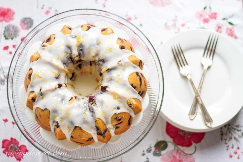 Blueberry Lemon Pound Cake - A deliciously moist classic pound cake stuffed full of ripe, juicy blueberries then drizzled with a simple lemon icing.