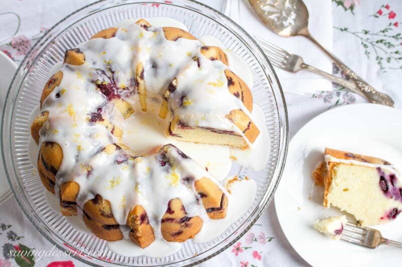 Blueberry Lemon Pound Cake - A deliciously moist classic pound cake stuffed full of ripe, juicy blueberries then drizzled with a simple lemon icing.