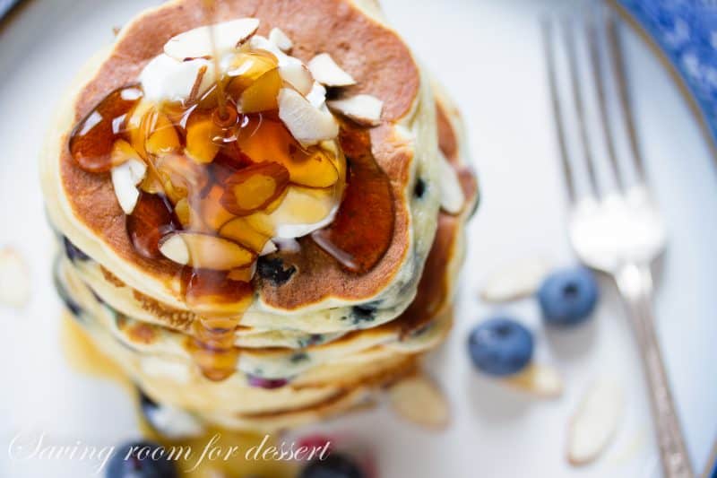 Fluffy Blueberry Greek Yogurt Pancakes ~ stuffed full of juicy ripe blueberries. A great way to start the day! www.savingdessert.com