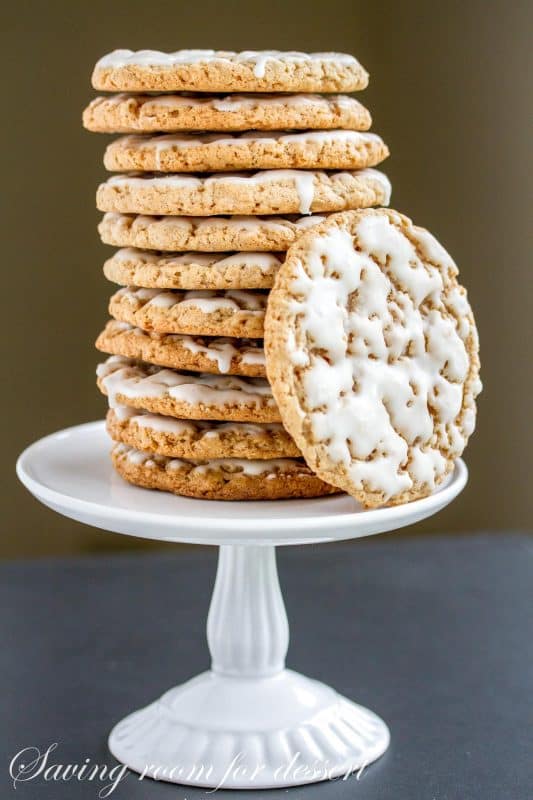 Stacked oatmeal cookies on a small cake stand
