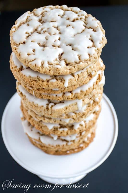 Old-Fashioned Iced Oatmeal Cookies in a stack with icing dripping down the sides