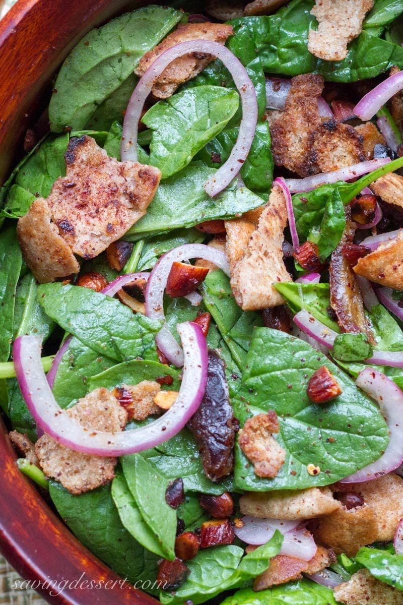 spinach, dates, pitas and almond salad