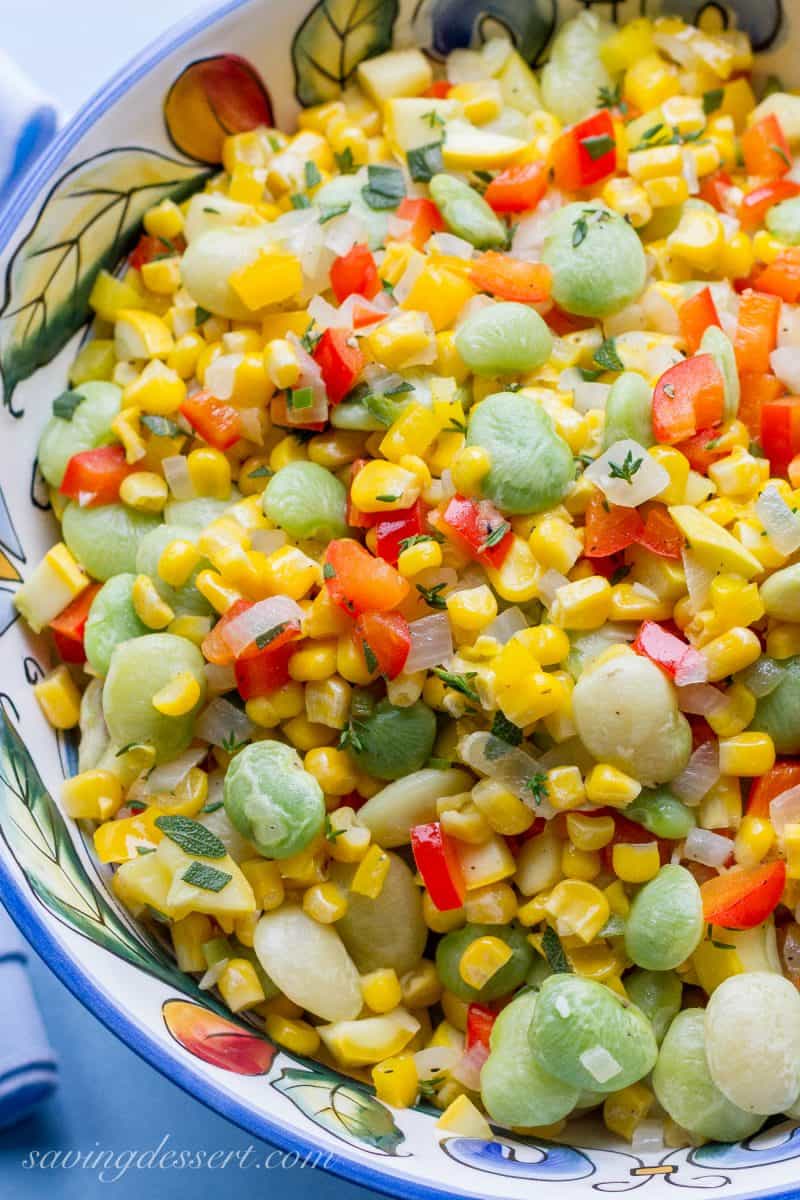 A bowl of summer succotash with lima beans, corn and peppers