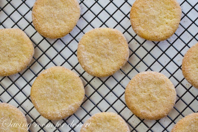 Dulce de Leche Sandwich Cookies with Cinnamon and Cardamom - a sweet, soft cookie coated with the warm flavors of cinnamon and cardamom then filled with a silky rich caramel. www.savingdessert.com #holidaycookies #cookie #dulcedeleche #sandwichcookies #savingroomfordessert