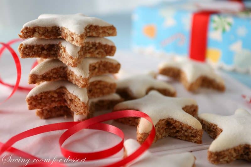 A stack of iced star cookies with a ribbon