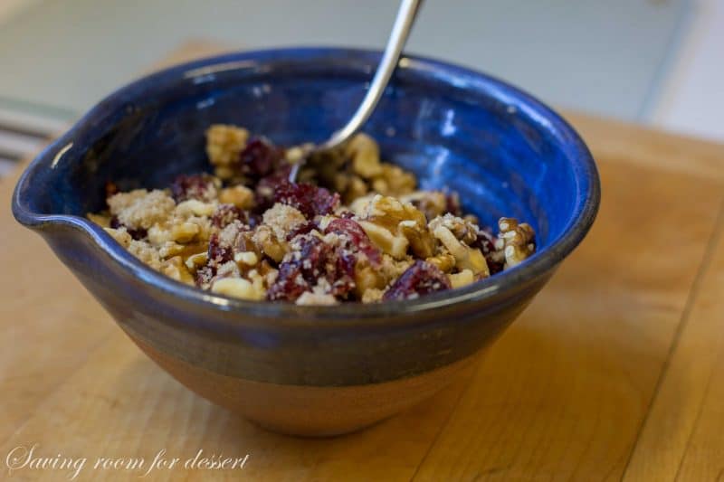 Cranberry Orange Walnut Sweet Bread - it's subtle orange flavor; soft, tender crumb, and surprise sweet fruit and nut filling are sure to please gift recipients and guests alike. www.savingdessert.com