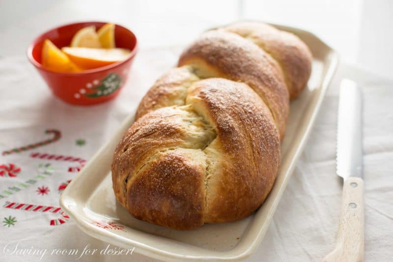 Cranberry Orange Walnut Sweet Bread - it's subtle orange flavor; soft, tender crumb, and surprise sweet fruit and nut filling are sure to please gift recipients and guests alike. www.savingdessert.com