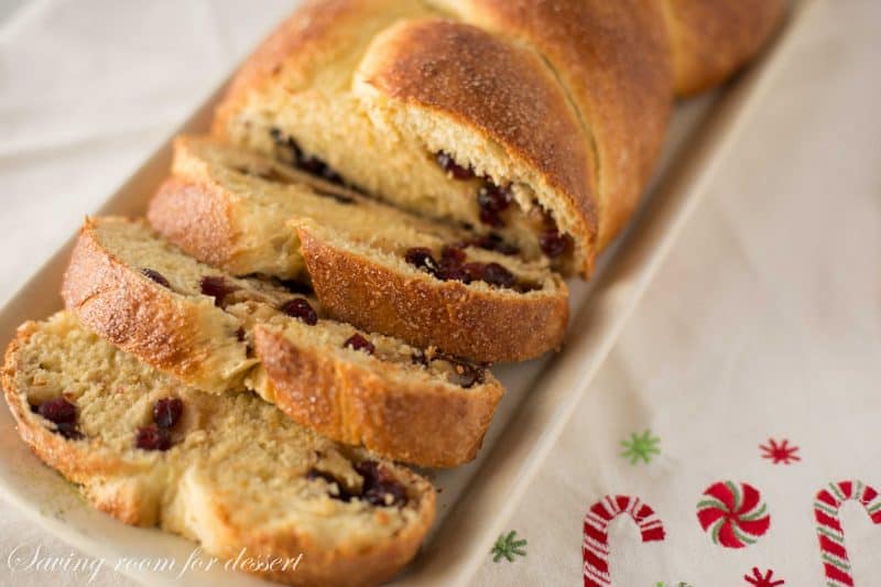 Cranberry Orange Walnut Sweet Bread - it's subtle orange flavor; soft, tender crumb, and surprise sweet fruit and nut filling are sure to please gift recipients and guests alike. www.savingdessert.com