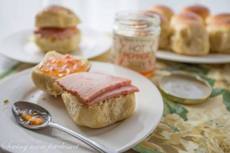 Easy Homemade Hawaiian Sweet Rolls -A lightly sweet roll flavored with pineapple juice for a hearty, fluffy, homemade treat that comes together in minutes. Terrific topped with ham, hot pepper jelly and your favorite cheese | www.savingdessert.com
