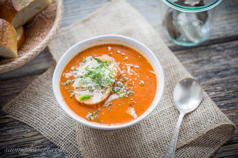 Roasted Tomato Basil Soup in a bowl with bread