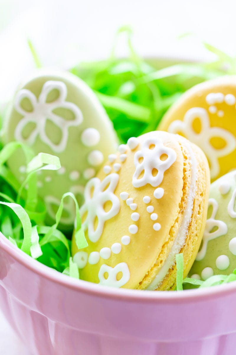 A bowl of simply decorated Easter Egg Macarons 