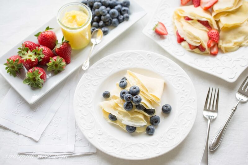 Crepes with Lemon Curd Whipped Cream - Perfectly fresh fruit served with homemade crepes with sweet, tart, bright and creamy lemon curd whipped cream.