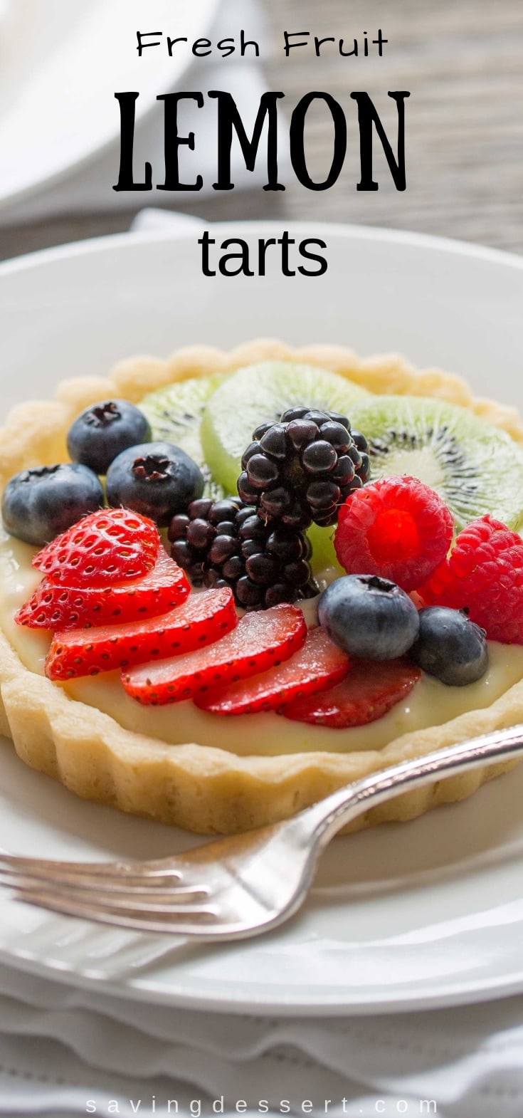 Fresh Fruit Lemon Tarts - a light fresh fruit tart with a simple shortbread crust filled with a mixture of cream cheese and lemon curd. #lemoncurd #lemontart #freshfruittart #dessert #tart #shortbreadtartcrust #lemondessert