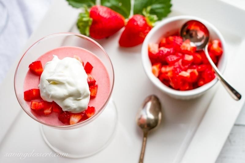 strawberry mousse with lemon whipped cream in a glass