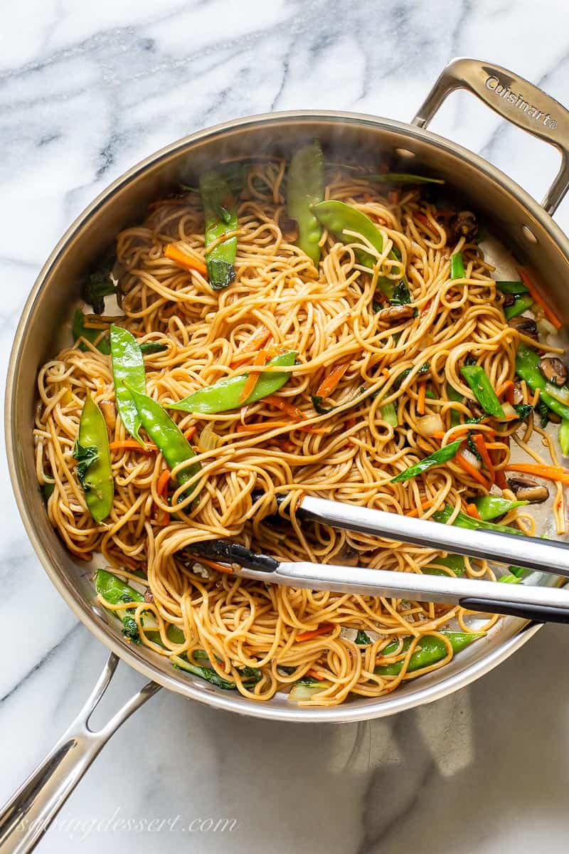 Overhead view of a skillet filled with vegetable lo mein noodles