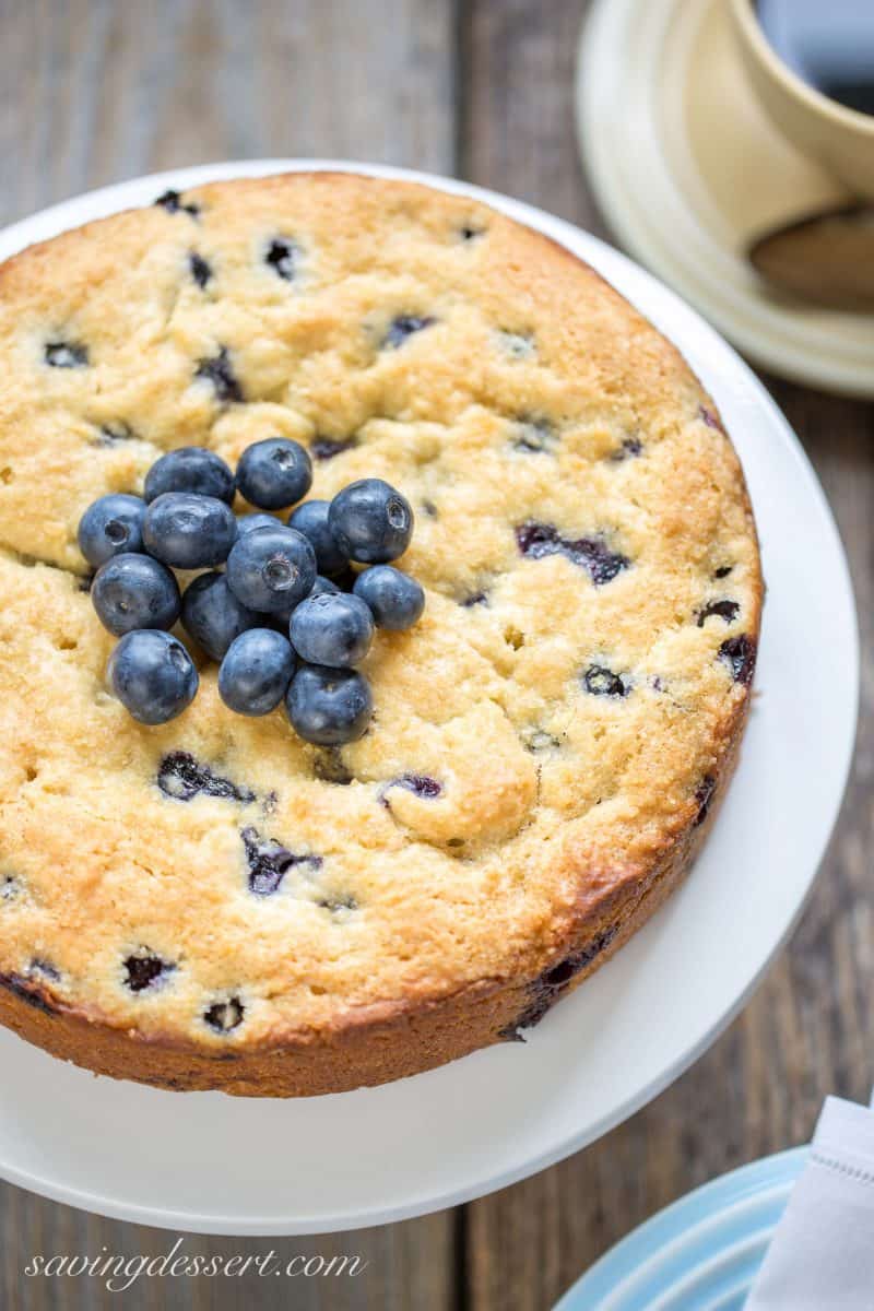 A blueberry breakfast cake with blueberries on top