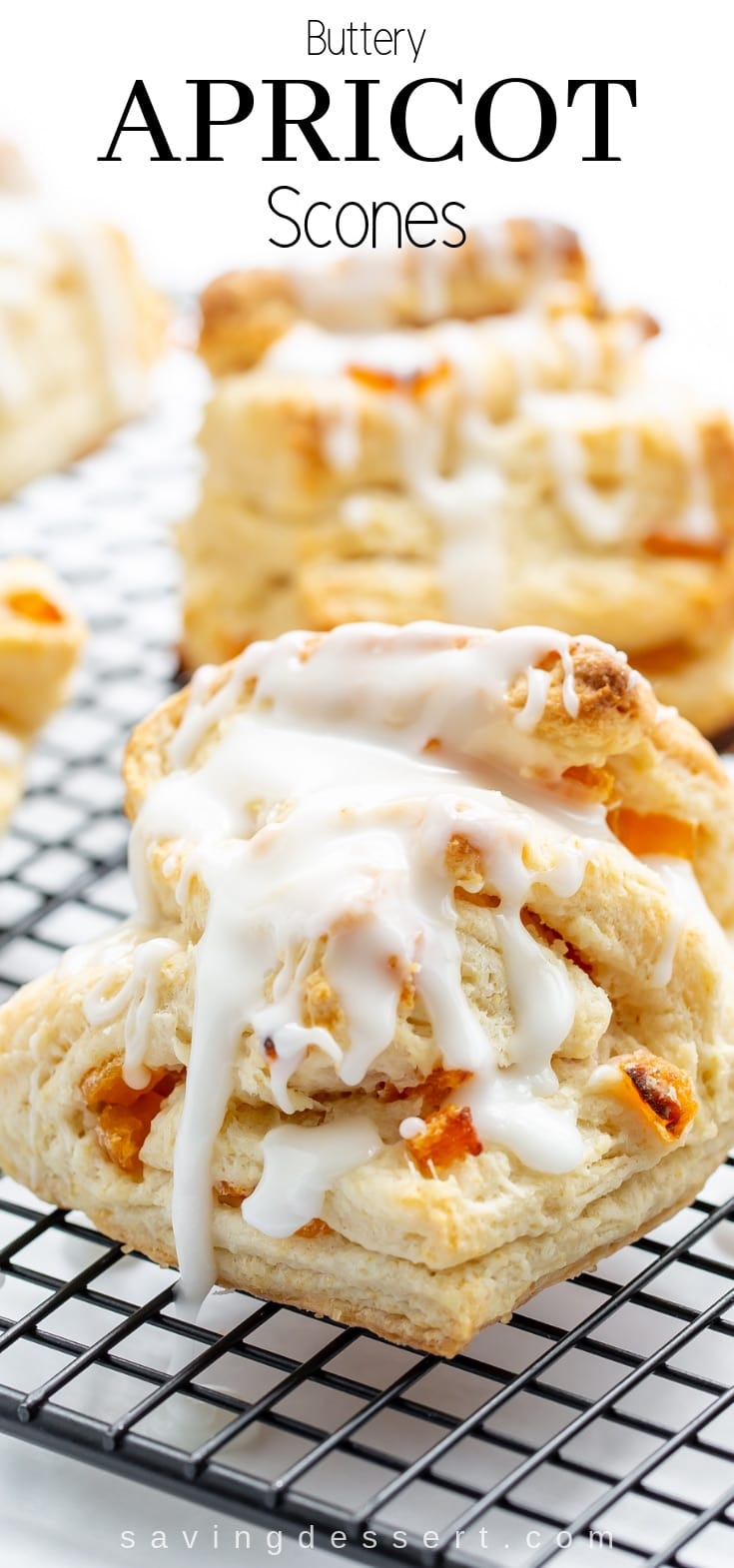 Buttery Apricot Scones ~ A light, flaky, buttery scone layered with chopped apricots and iced with an almond flavored glaze. #apricot #scones #baking #breakfast #brunch #flakyscones