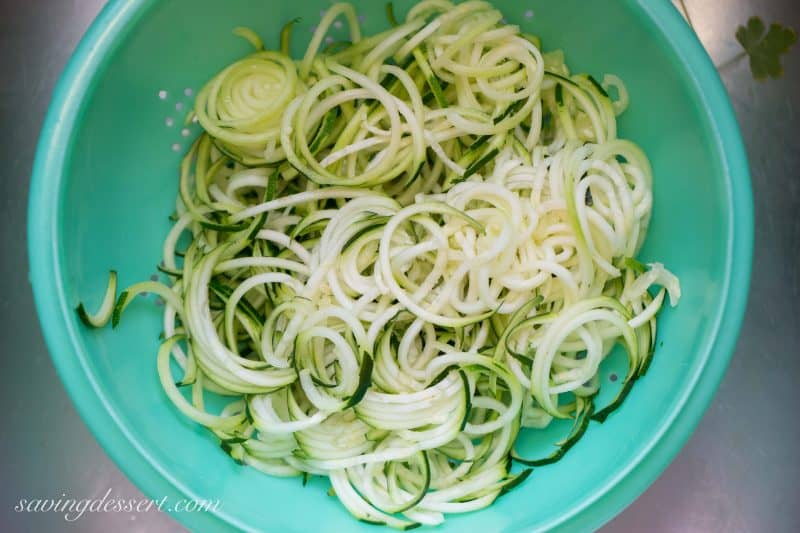 Shrimp Piccata - Zucchini noodles (zoodles) tossed with shrimp sautéed in garlic and topped with a white wine sauce. Served with capers and a squeeze of lemon ... dinner is on the table in less than 45 minutes! From Saving Room for Dessert