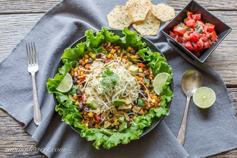 Meatless Monday Taco Salad - a deliciously spiced vegetarian salad layered with summer fresh corn and tomatoes