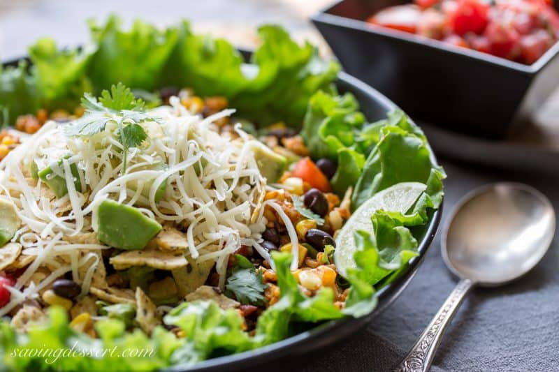 Meatless Monday Taco Salad - a deliciously spiced vegetarian salad layered with summer fresh corn and tomatoes