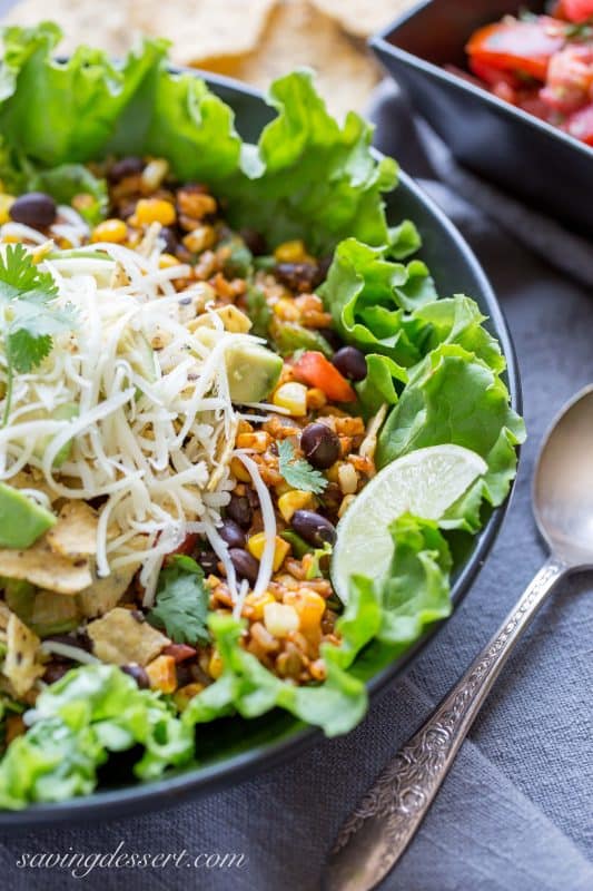 Meatless Monday Taco Salad - a deliciously spiced vegetarian salad layered with summer fresh corn and tomatoes