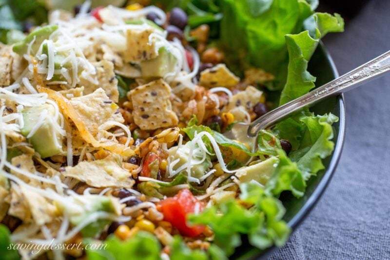 Meatless Monday Taco Salad - a deliciously spiced vegetarian salad layered with summer fresh corn and tomatoes