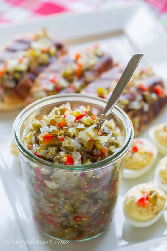 Homemade Sweet Pickle Relish - made with fresh from the garden cucumbers. Delicious served on hot dogs, deviled eggs or in all your summer salads. www.savingdessert.com