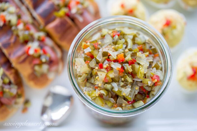 Homemade Sweet Pickle Relish - made with fresh from the garden cucumbers. Delicious served on hot dogs, deviled eggs or in all your summer salads. www.savingdessert.com