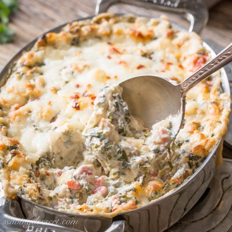 Southwestern spinach dip with tomatoes and red pepper flakes