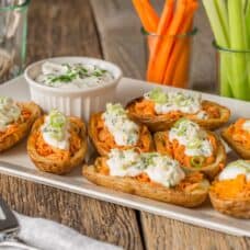 Platter of Buffalo Chicken Potato Skins with Blue Cheese Dip.