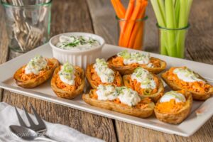 Platter of Buffalo Chicken Potato Skins with Blue Cheese Dip.
