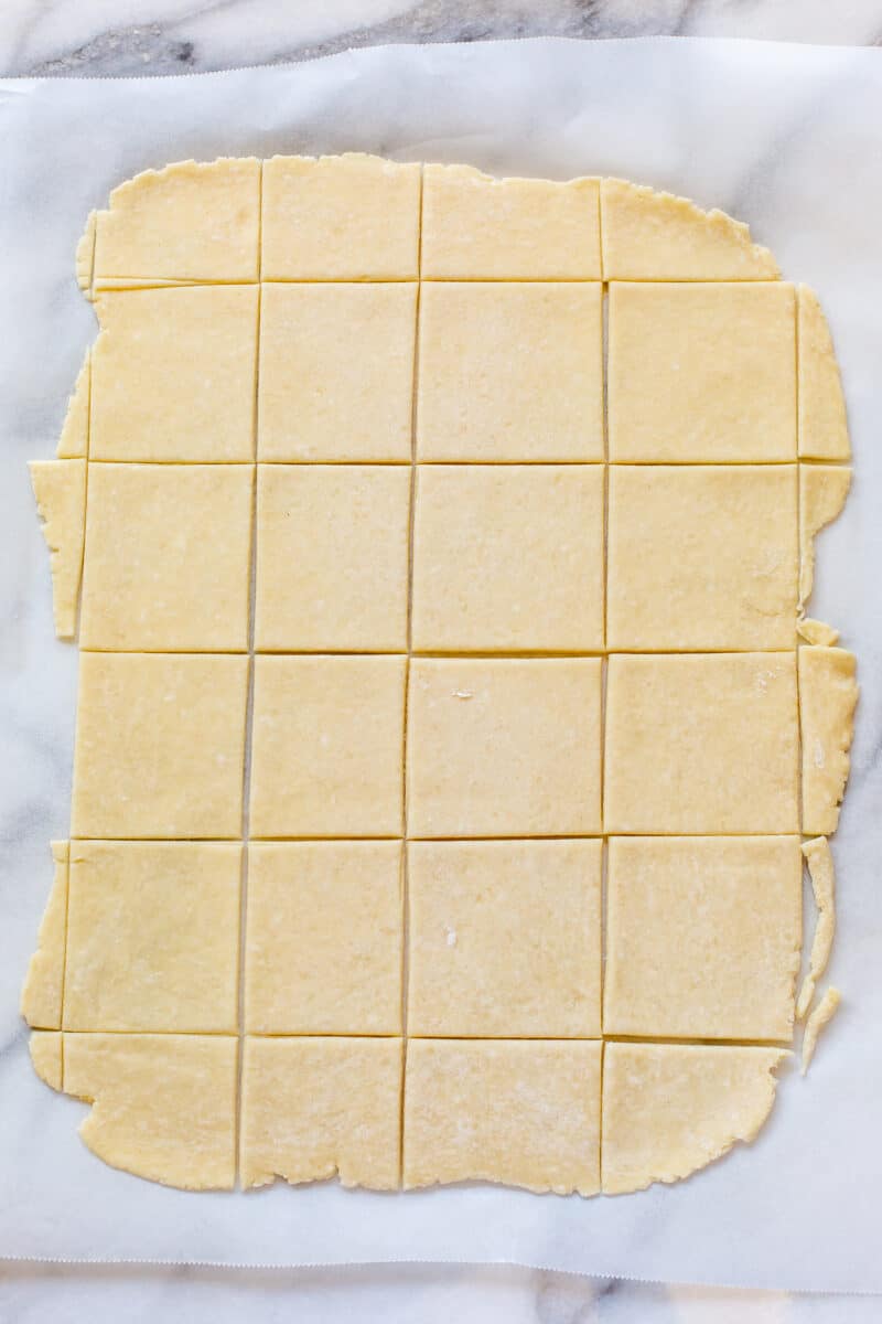 A pastry crust rolled into a rectangle and cut into squares