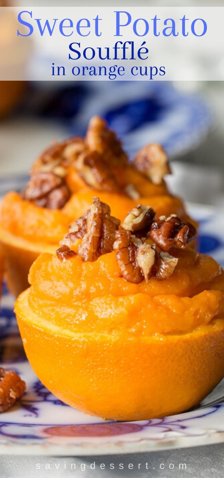 Sweet potato casserole served in orange cups and topped with sugared pecans