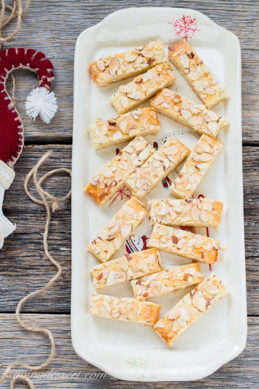 Almond Butter Sticks -Almond Butter Sticks are a melt-in-your-mouth delicious, tender cookie made with a cream cheese dough and an almond extract sugar filling