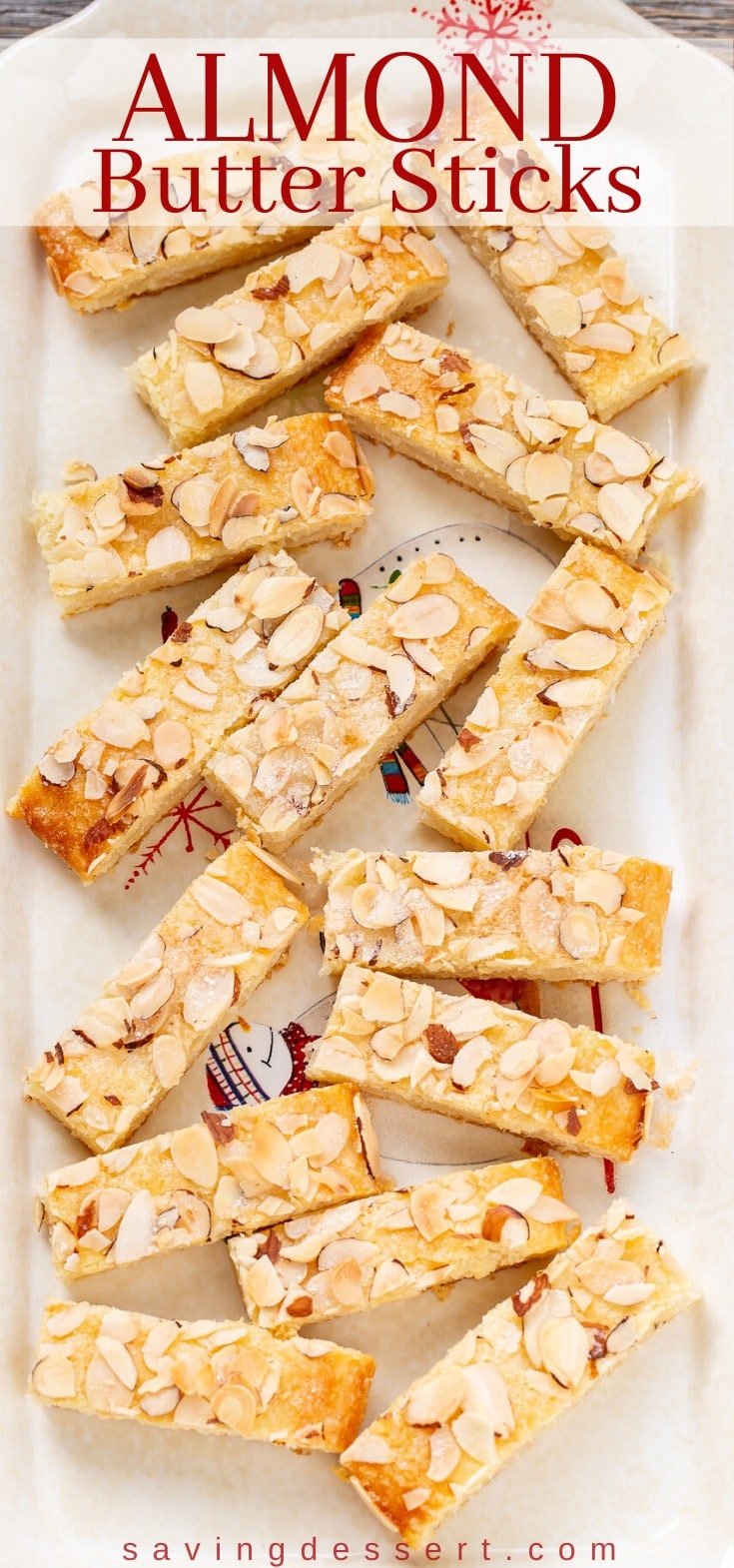 A plate of almond butter sticks topped with sliced almonds