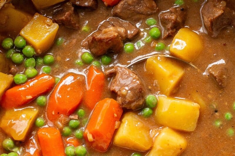 An overhead view of a Dutch Oven with beef stew