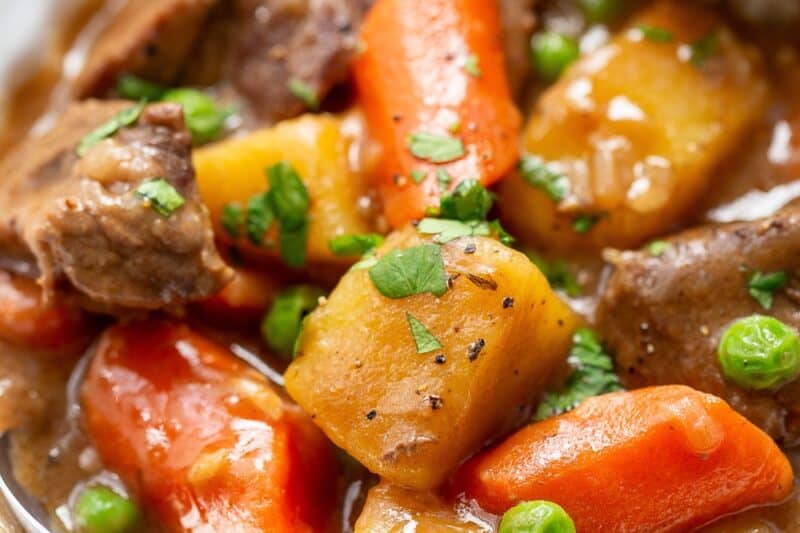 A big bowl of Guinness Beef Stew with chunks of beef, potatoes and carrots.