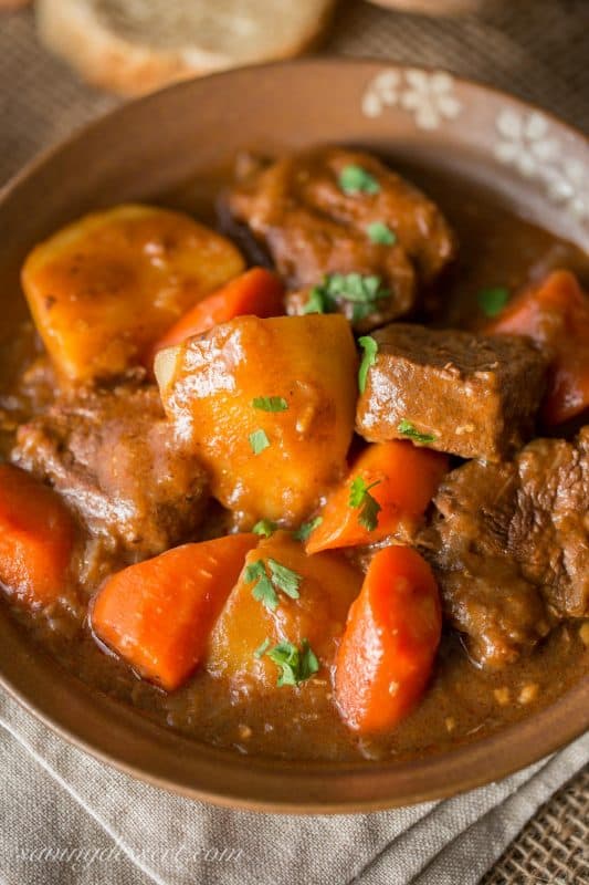 Beef stew with chunks of potatoes and carrots in a rich meaty broth