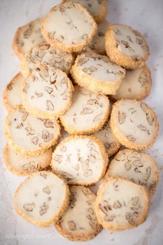 Pecan Sandies ~ Classic shortbread cookies filled with toasted pecans and vanilla beans with a crisp coating of coarse sugar make these a wonderful and delicious "perfect anytime cookie." www.savingdessert.com